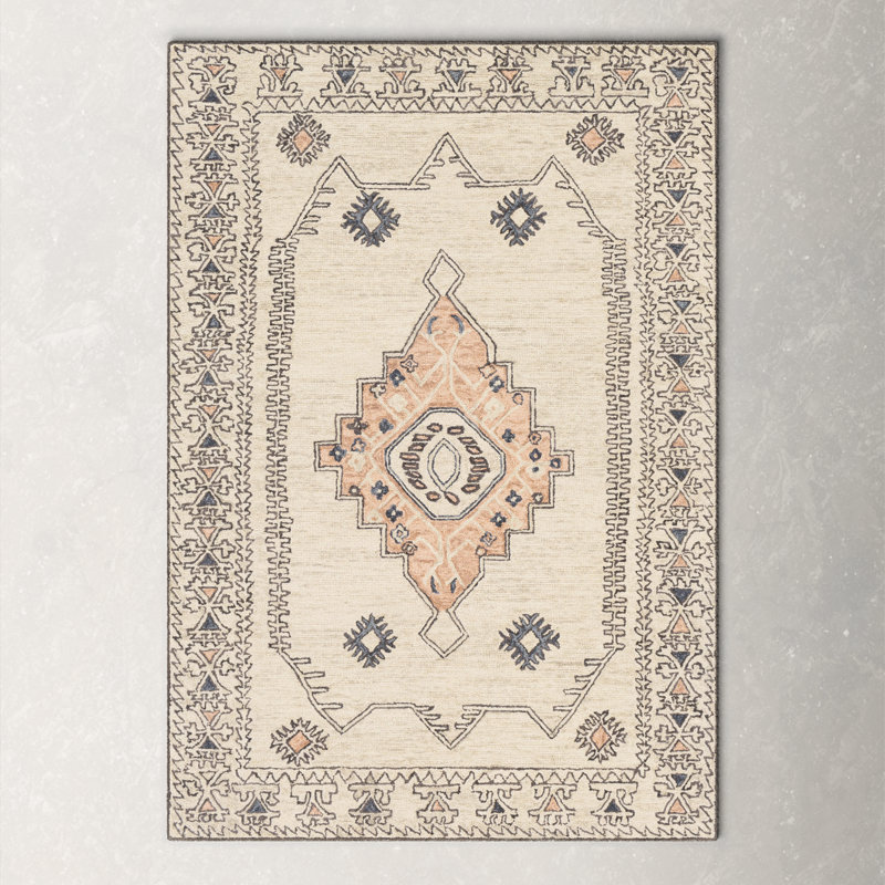 Ivory and Peach Hand Tufted Wool Area Rug 5' x 7'6"