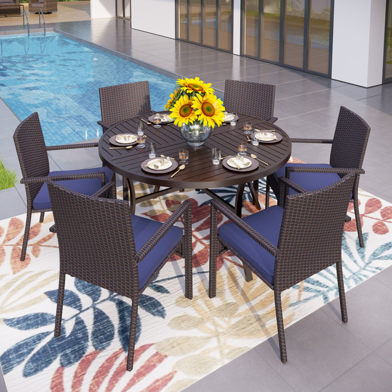 Sutiya 6 - Person Patio Dining Set with Round Table , Cushions Included, Blue
