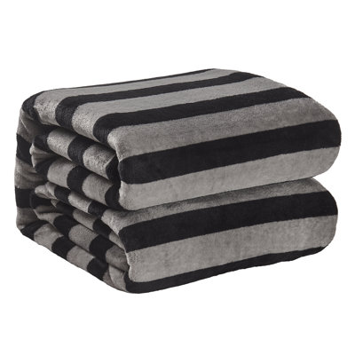 Couverture rayée en flanelle