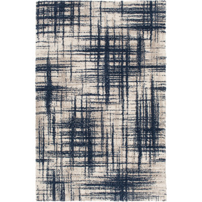 Tapis crème / bleu marine