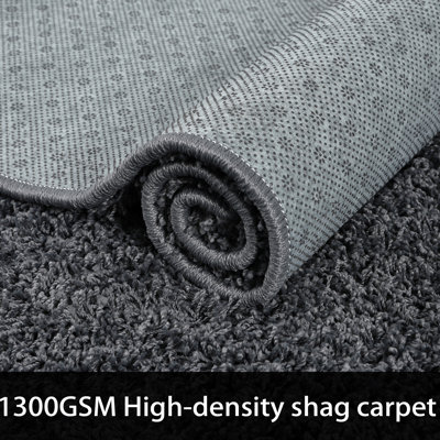 Tapis intérieur / extérieur gris foncé en polypropylène tissé à la machine Hailes