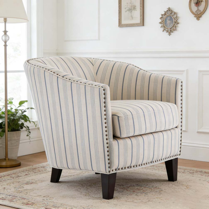 Fauteuil demi-tonneau rembourré à rayures