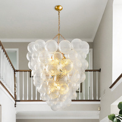 Lustre 12 lumières de luxe moderne, design en verre transparent