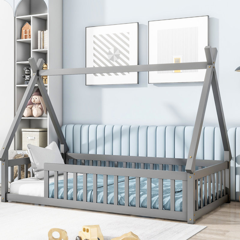 Lit simple gris avec garde-corps - offrant un espace de chambre confortable