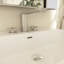 Meuble-lavabo simple 24 po avec surface solide Zykaria-936289981-936289982