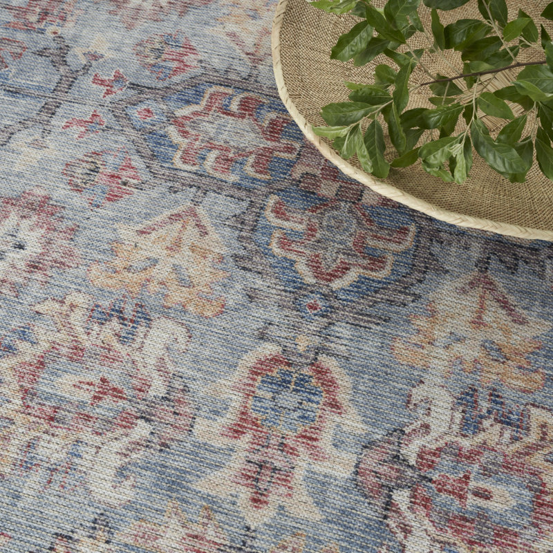 Tapis bleu floral tissé à la machine 9 pi x 12 pi