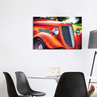 Chrome And Smooth Curves Of A Roadster by George Oze - Wrapped Canvas Print