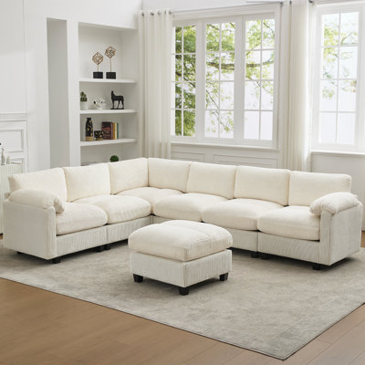 Canapé modulaire 7 places avec accoudoirs coussinés 7 places