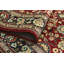 Tapis rouge pak-persan en particules