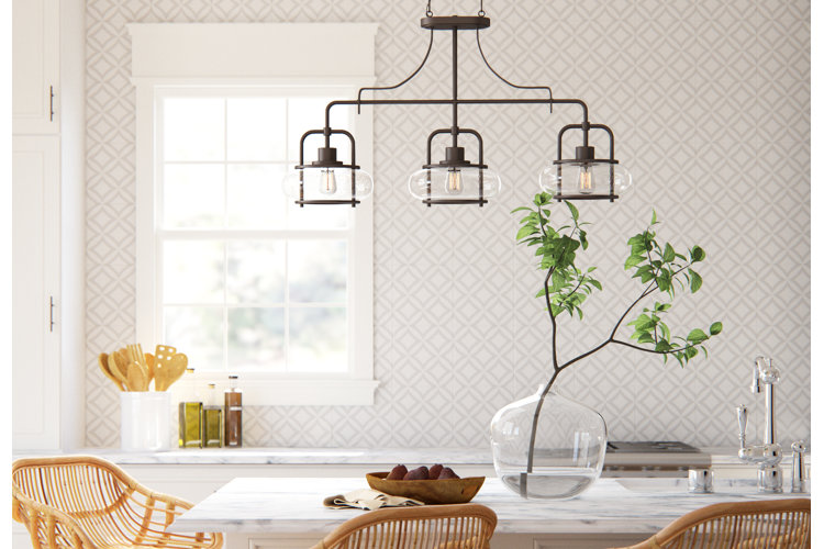 Transitional kitchen island with marble counter tops and rattan high chairs