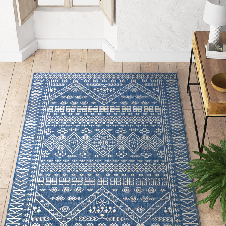 https://assets.wfcdn.com/im/84388894/resize-h755-w755%5Ecompr-r85/2761/276108232/Royalston+Power+Loom+Tribal+Blue+Indoor%2FOutdoor+Patio+Rug.jpg