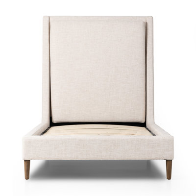 Potter Upholstered Wingback Bed