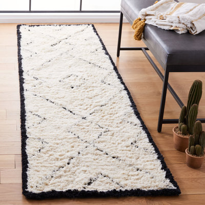Tapis ivoire en laine touffeté à la main à motif géométrique Simoneaux