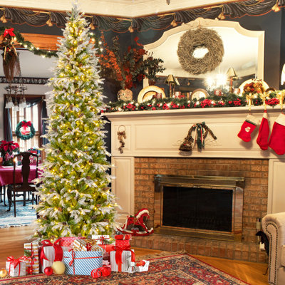 9 Ft. Flocked Christmas Tree With Warm Light Pinecone