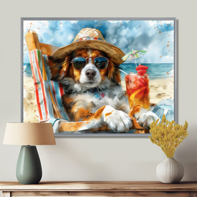 Bouvier bernois avec un cocktail sur la plage