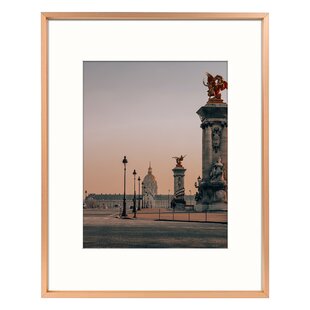 https://assets.wfcdn.com/im/84410428/resize-h310-w310%5Ecompr-r85/1854/185410091/ailisa-metal-picture-frame-photo-frame-with-ivory-mat-horizontal-and-vertical-formats-for-wall.jpg