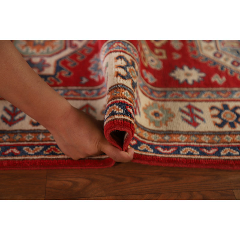 Tapis rouge à motif géométrique Kazak