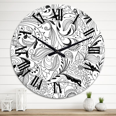 Horloge murale à motif floral noir et blanc
