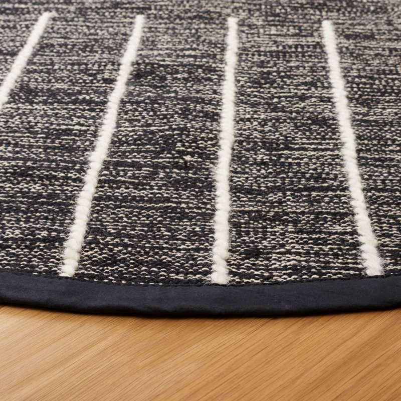Flore Geometric Handmade Kilim Wool/Cotton Area Rug in Black/Ivory, Round 6'