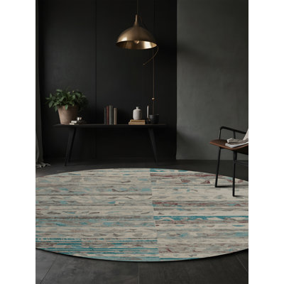 Tapis gris soyeux et moelleux