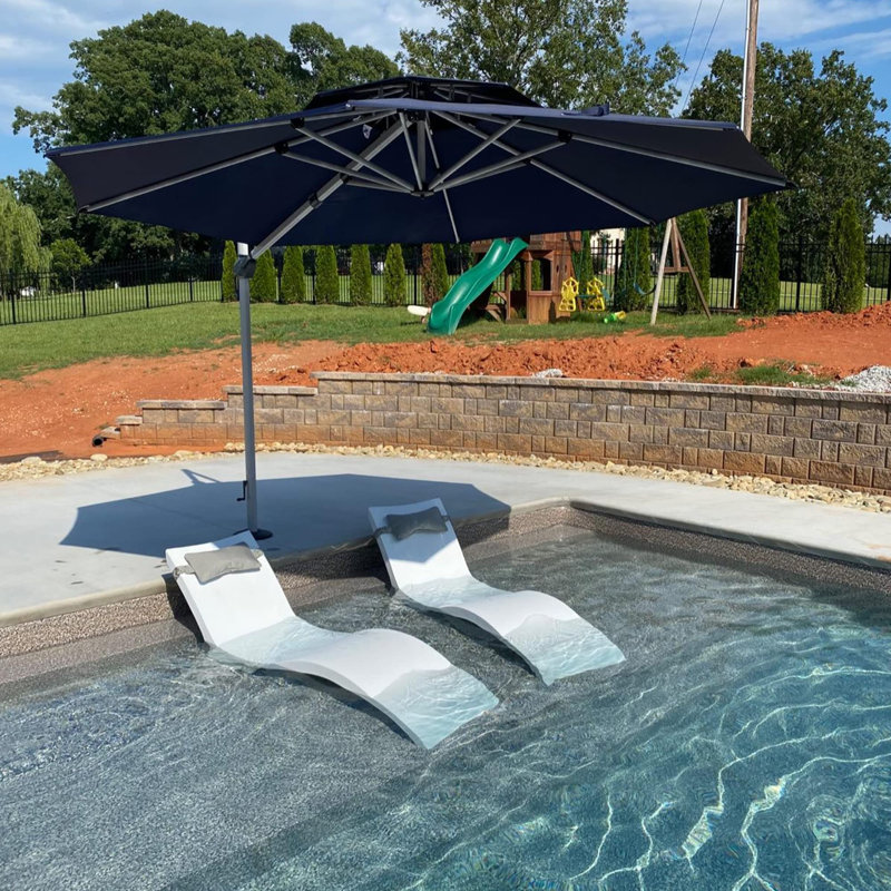 Sharayne 144'' Cantilever Umbrella with Crank Lift Counter Weights with Base in Ground, Navy