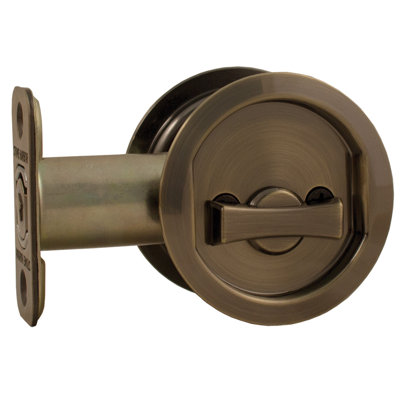 Serrure ronde pour porte escamotable
