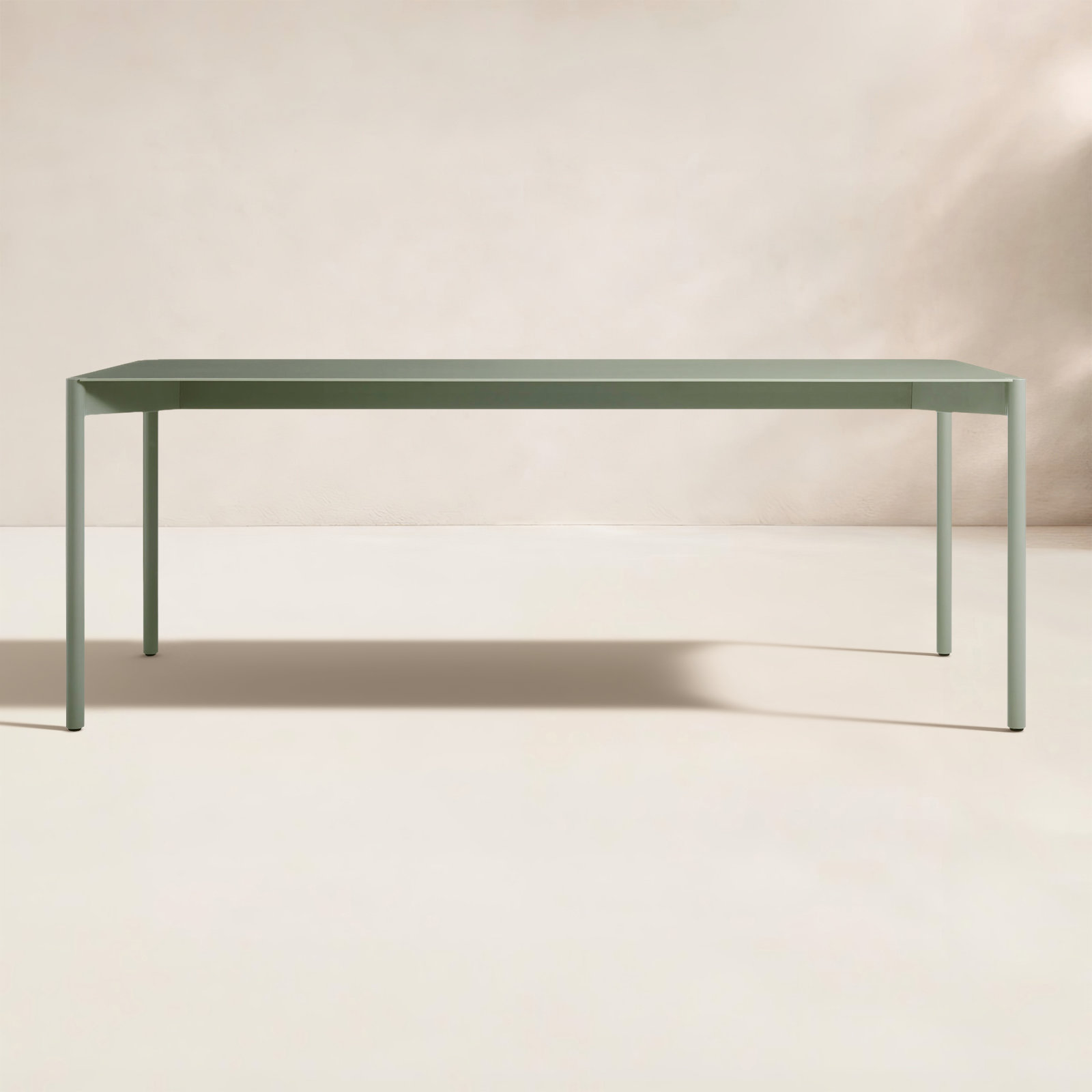 Comeuppance 80'' Metal Outdoor Dining Table, Gray Green