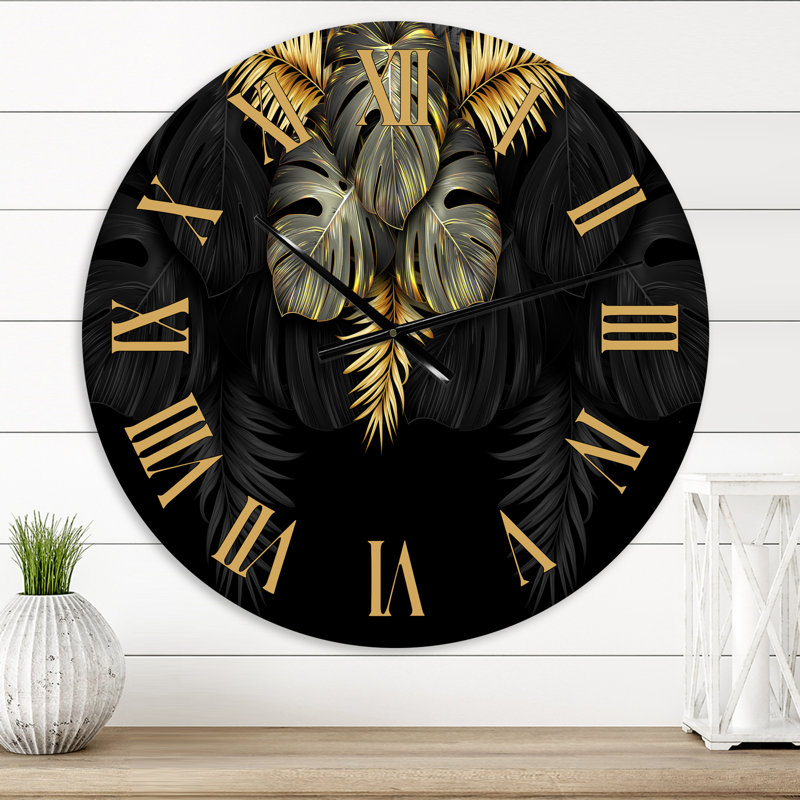 Feuilles tropicales noires et dorées IV - horloge murale moderne, Moyen