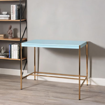 Metal writing desk with USB port for modern home offices, deep blue desktop and gold open base