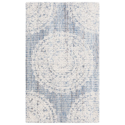 Ebony Hand Tufted Wool Cotton with Latex Floral Rug in Ivory/Blue