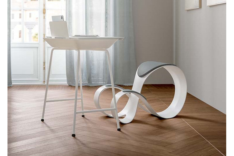 White kneeling chair in home office
