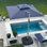 Parasol carré en porte-à-faux 120 po avec base à roulettes, bleu marine