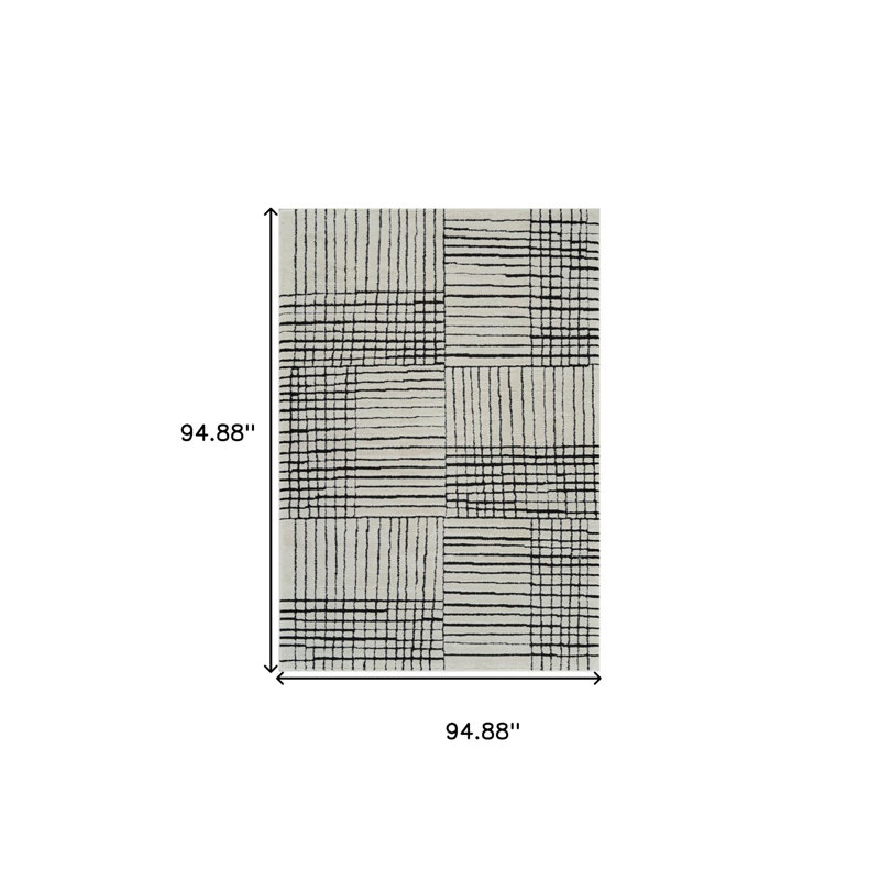 Tapis crème et noir 8 pi x 11 pi