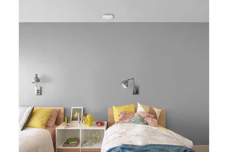 bedroom with a smoke detector