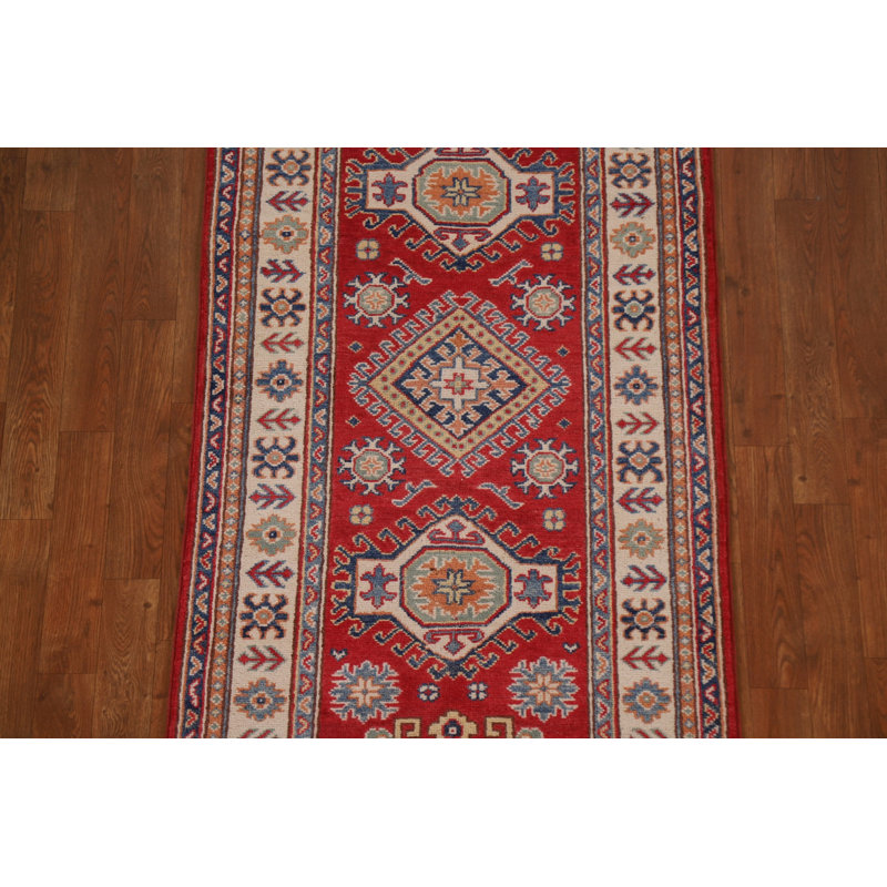 Tapis rouge à motif géométrique Kazak
