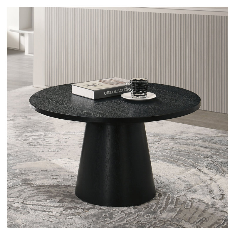 Table basse ronde moderne avec base en forme de cône en noir