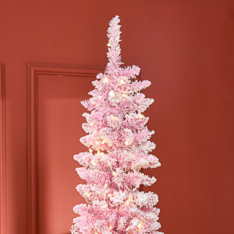 Arbre de Noël artificiel enneigé
