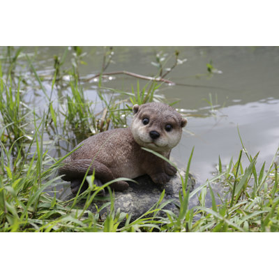 Otter Laying Back Statue