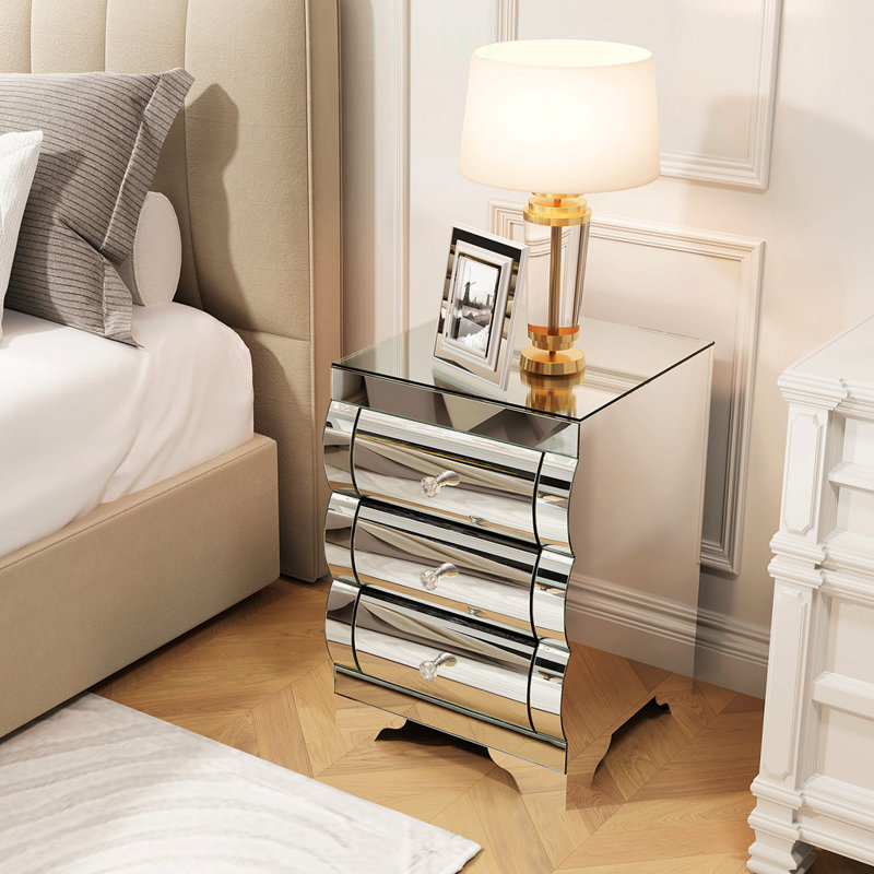 Table de chevet en verre incurvé avec miroir et 3 tiroirs, idéale pour les petits espaces : un meuble de chambre élégant et fonctionnel.