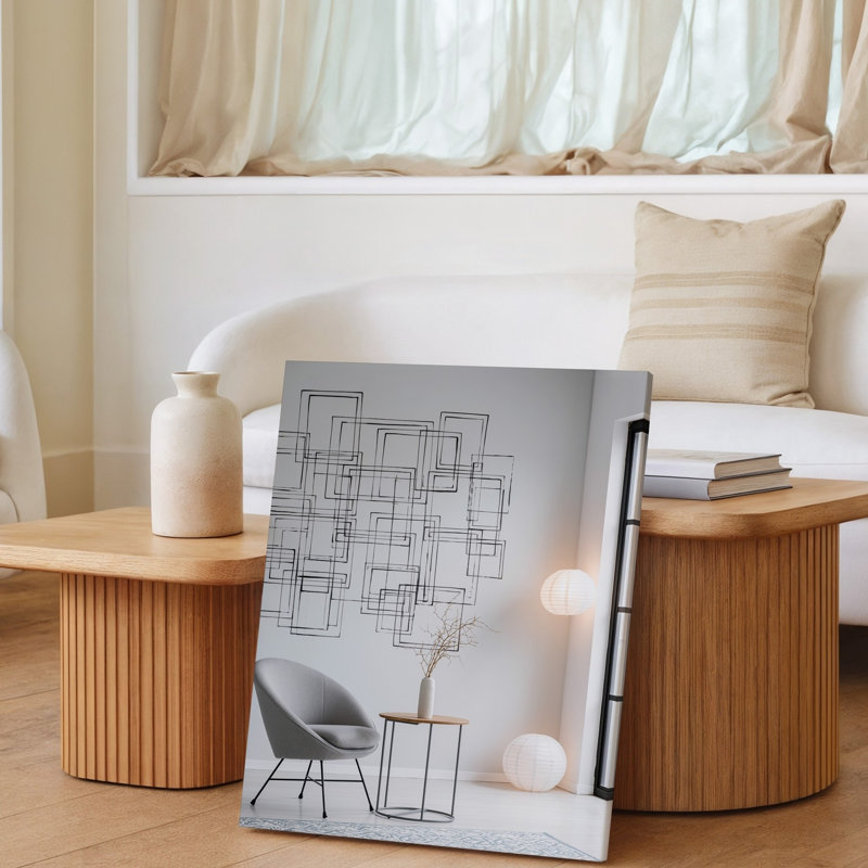 Toile une scène intérieure minimaliste avec un art mural lisse gris clair orné d'un dessin au trait noir géométrique créant une toile d'art murale