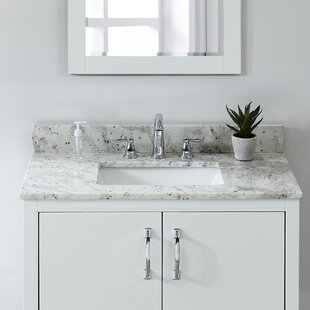 https://assets.wfcdn.com/im/84505500/resize-h310-w310%5Ecompr-r85/1129/112947874/31-granite-single-vanity-top-with-sink-and-3-faucet-holes.jpg