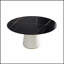Table de salle à manger ronde moderne en pierre artificielle noire avec base en polyuréthane beige, pouvant accueillir 6 personnes pour des repas et des rassemblements élégants.-488618645-488618643