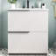 Meuble-lavabo de 30 po avec lavabo en céramique blanche, tiroirs pleine extension et butées noires pour un style contemporain de style tiroir fonctionnel