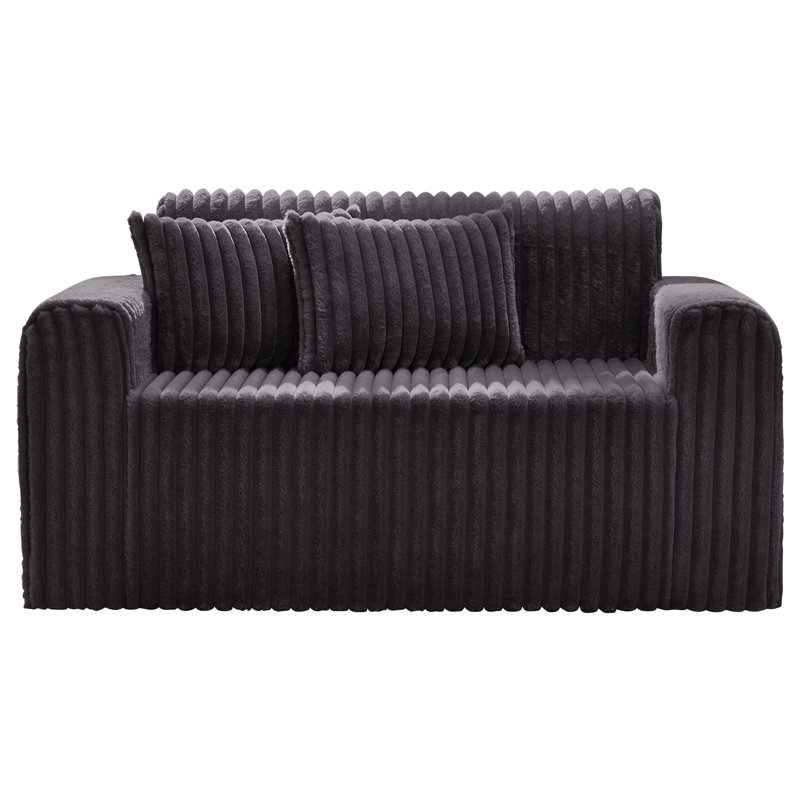 Canapé 2 places en mousse de 137 cm de large avec coussins décoratifs, canapé rembourré confortable et compact pour petits espaces, idéal pour un salon d'appartement.