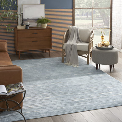 Tapis d'intérieur moderne bleu Ebern Designs Prasun