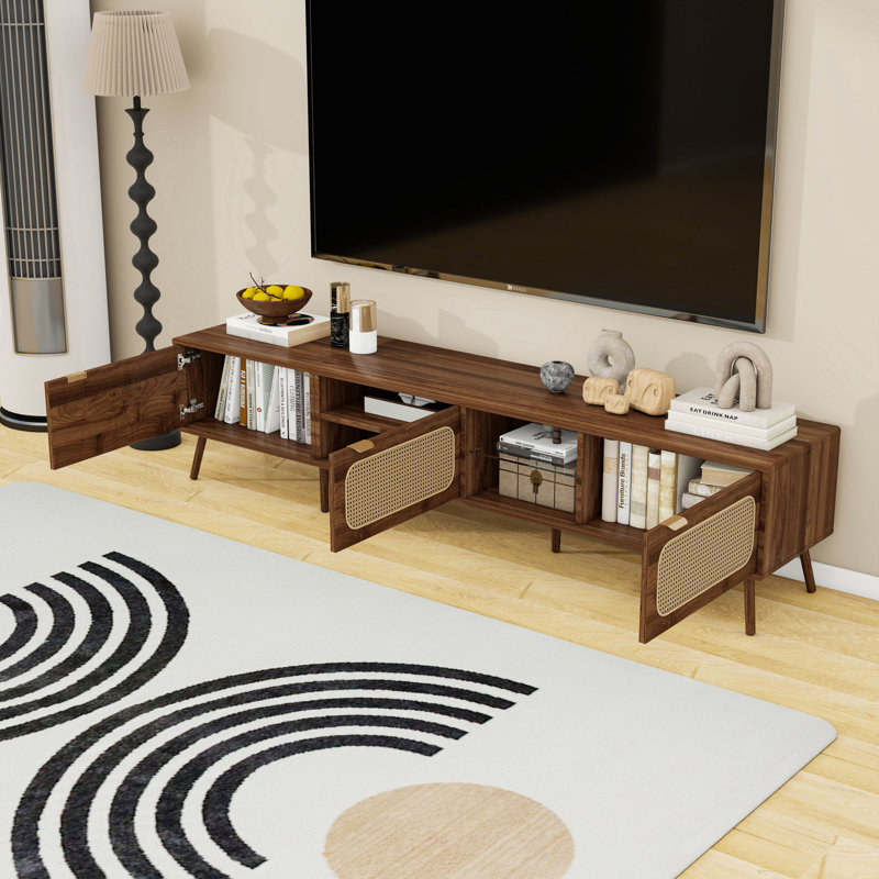 Meuble télé avec portes en rotin, tablette en verre et pieds robustes