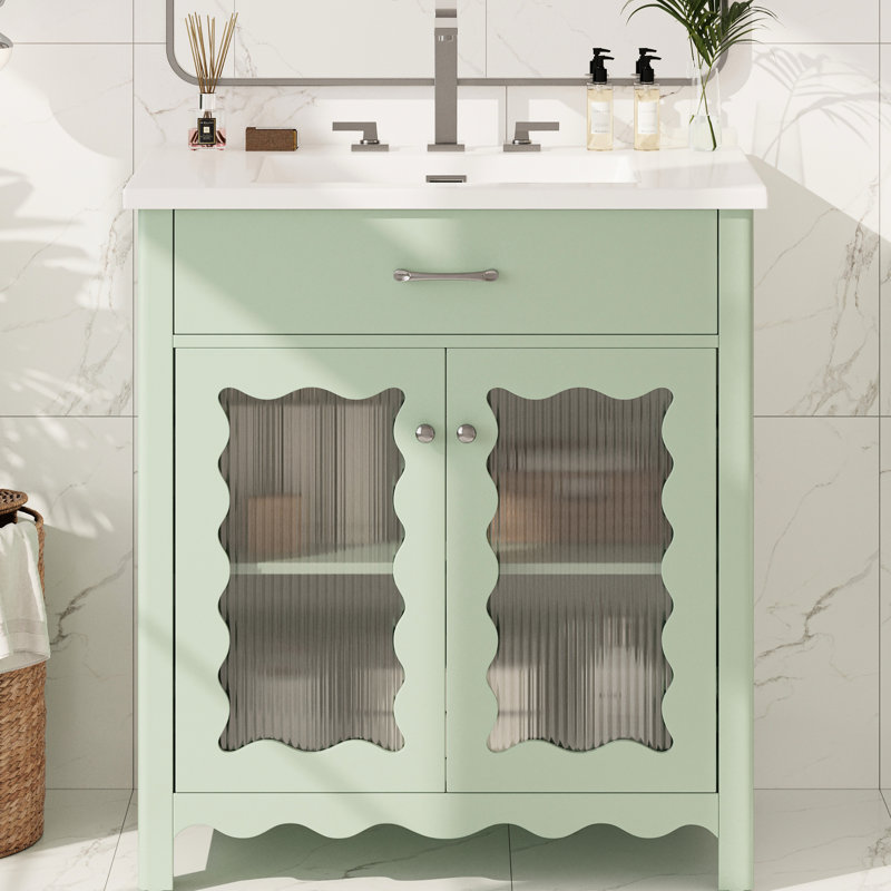Meuble-lavabo de 79 cm avec lavabo rectangulaire en céramique, grand espace de rangement, rayures verticales et poignées argentées pour un design moderne et élégant. Profil incurvé, esthétique accueillante.
