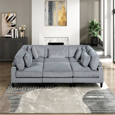 Fauteuil sans accoudoirs en velours côtelé gris