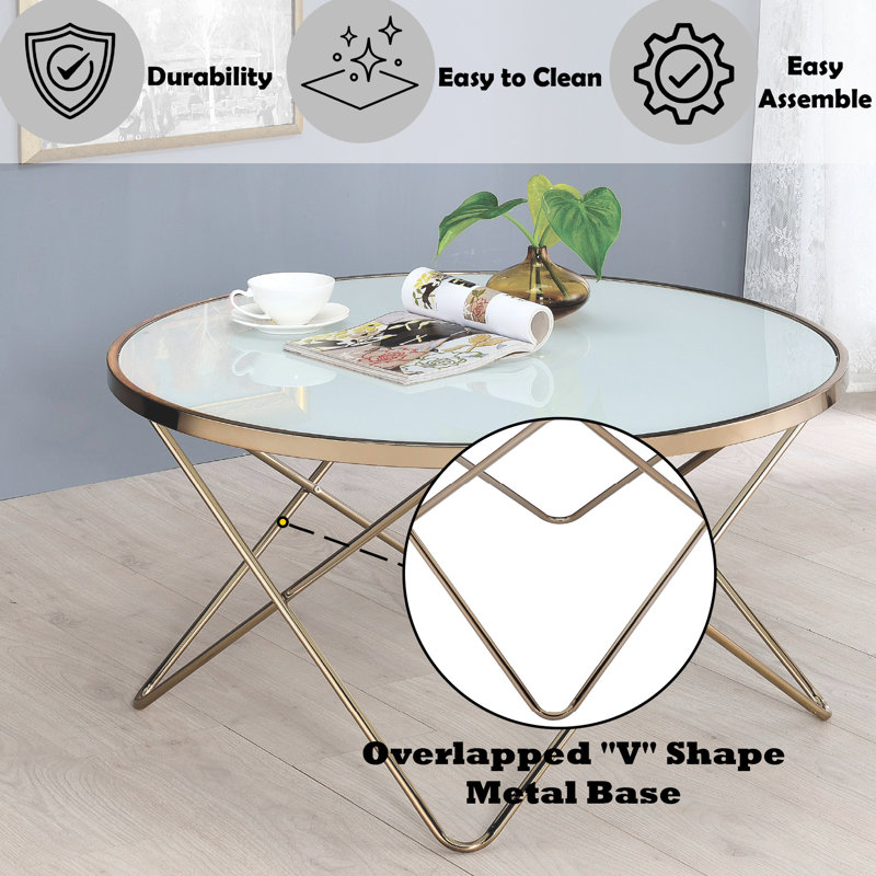 Table basse en verre givré de conception moderne avec base élégante en métal champagne