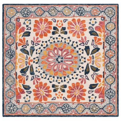 Onasis Hand Tufted Wool Cotton Floral Rug in Red/Ivory